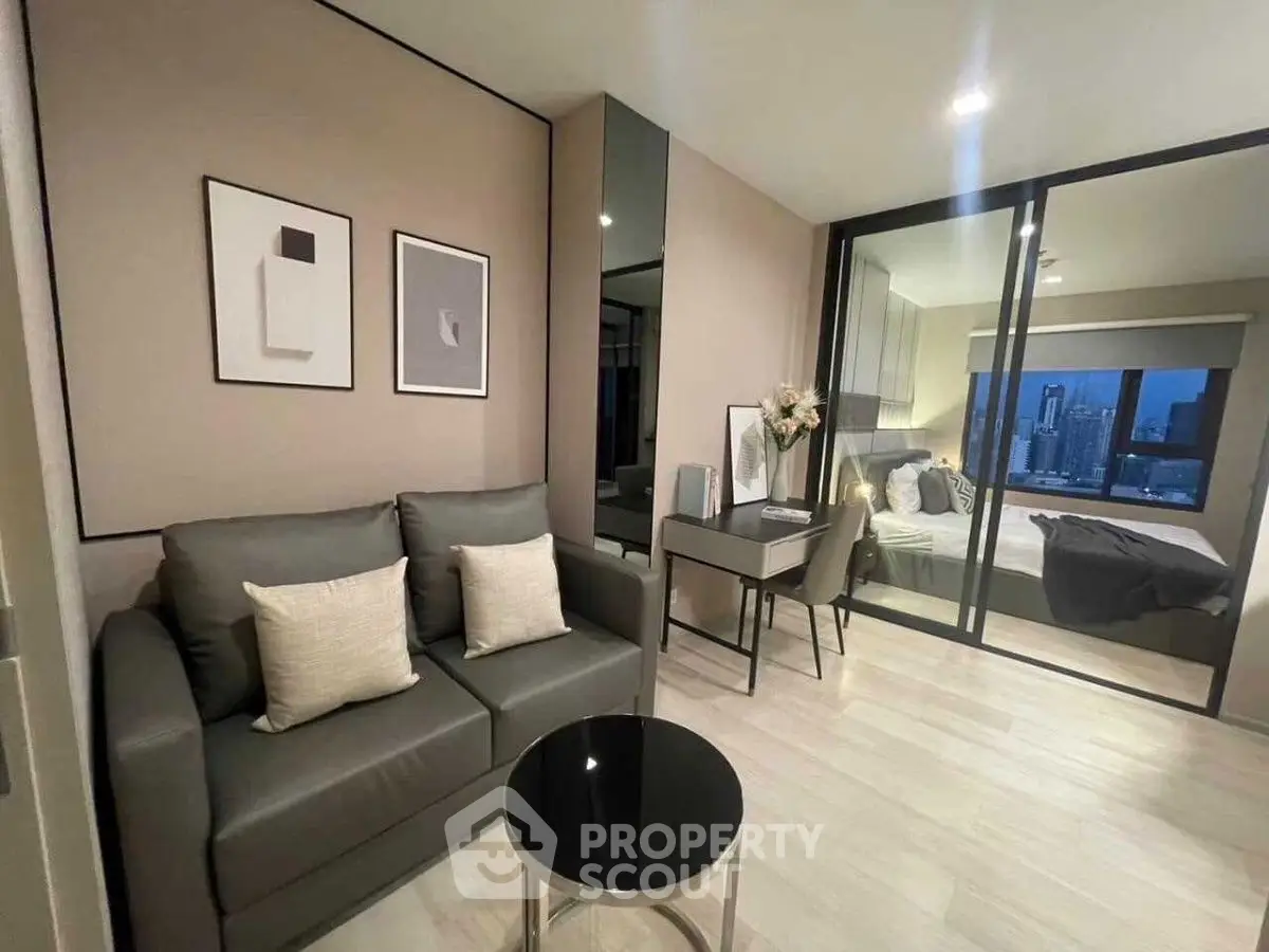 Modern living room with sleek decor and city view in luxury apartment