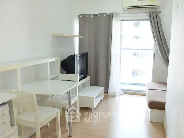 Bright and cozy living room with modern furniture and large window