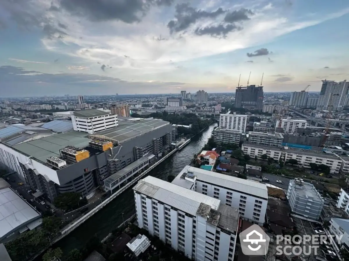 Stunning cityscape view from high-rise building with river and skyline