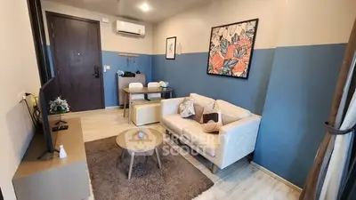 Chic modern living room with stylish decor and cozy seating area, perfect for relaxation and entertainment.