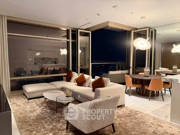 Luxurious modern living room with panoramic city views, elegant furniture, and ambient lighting for a sophisticated lifestyle.