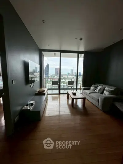 Modern living room with city view and stylish furniture