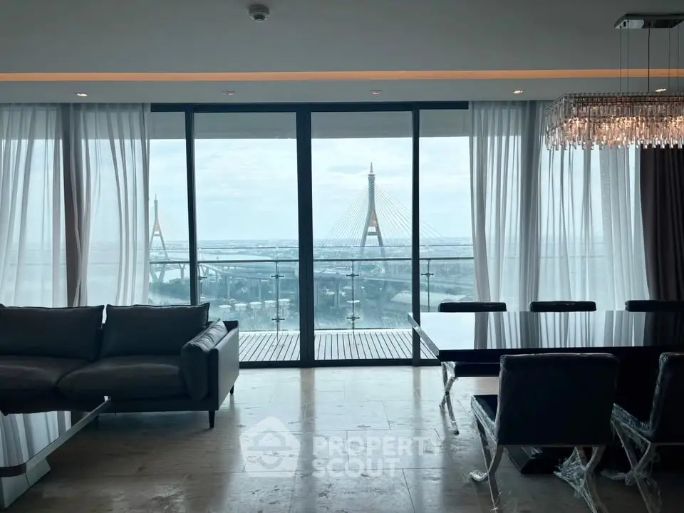 Luxurious living room with stunning bridge view and elegant decor