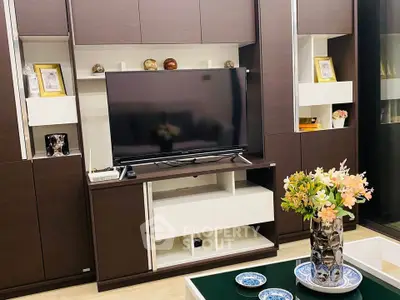 Stylish living room with modern entertainment center and elegant decor