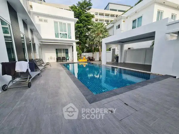 Luxurious modern villa with private pool and spacious outdoor area, perfect for relaxation and entertainment.