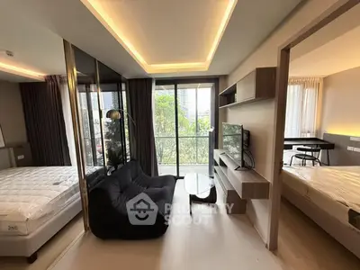 Modern apartment interior with cozy living area and large windows offering city views