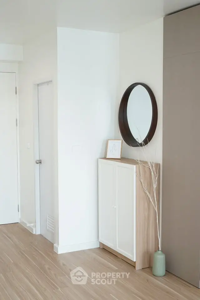 Modern minimalist interior with wooden flooring and stylish decor