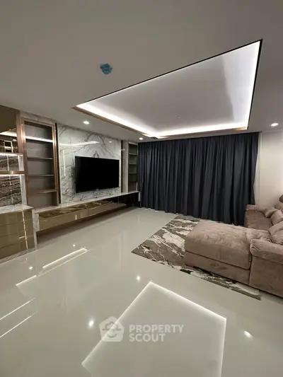 Luxurious modern living room with sleek design and elegant lighting