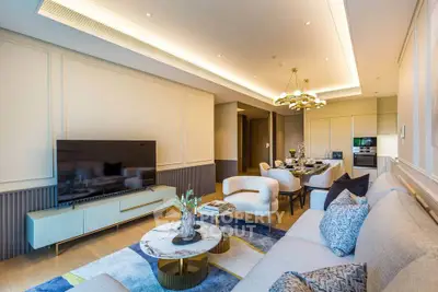 Luxurious modern living room with elegant decor and open dining area, featuring stylish furniture and ambient lighting.
