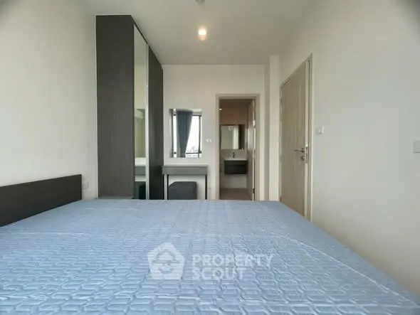 Modern bedroom with ensuite bathroom and sleek design