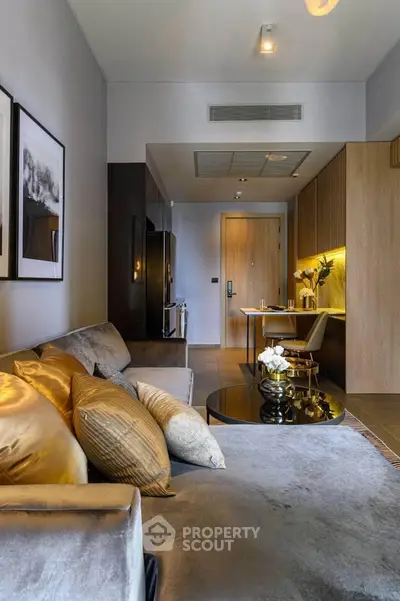 Luxurious modern living room with elegant decor and cozy seating area.