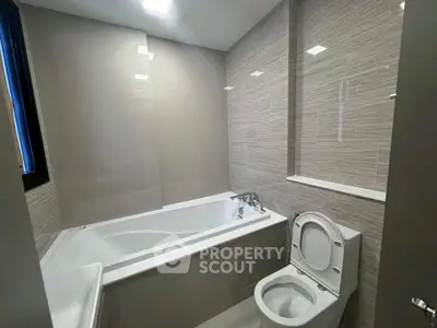 Modern bathroom with sleek bathtub and contemporary design