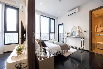 Luxurious bedroom with city view and modern decor