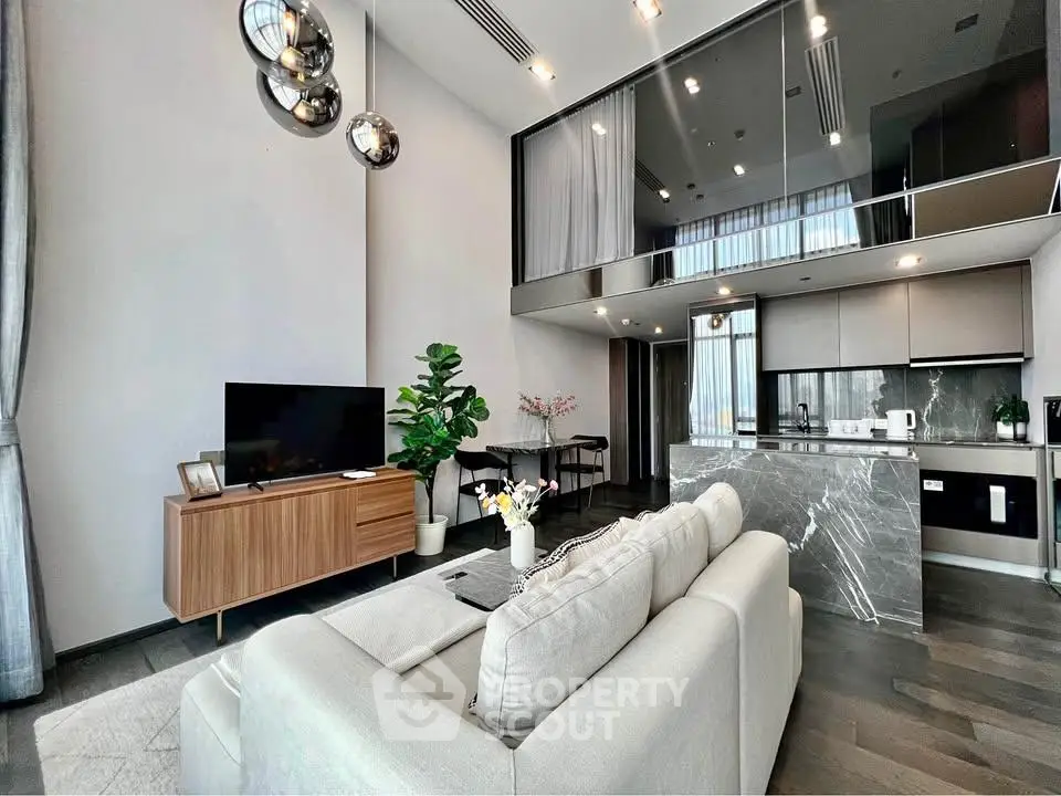 Luxurious modern living room with high ceilings and stylish decor