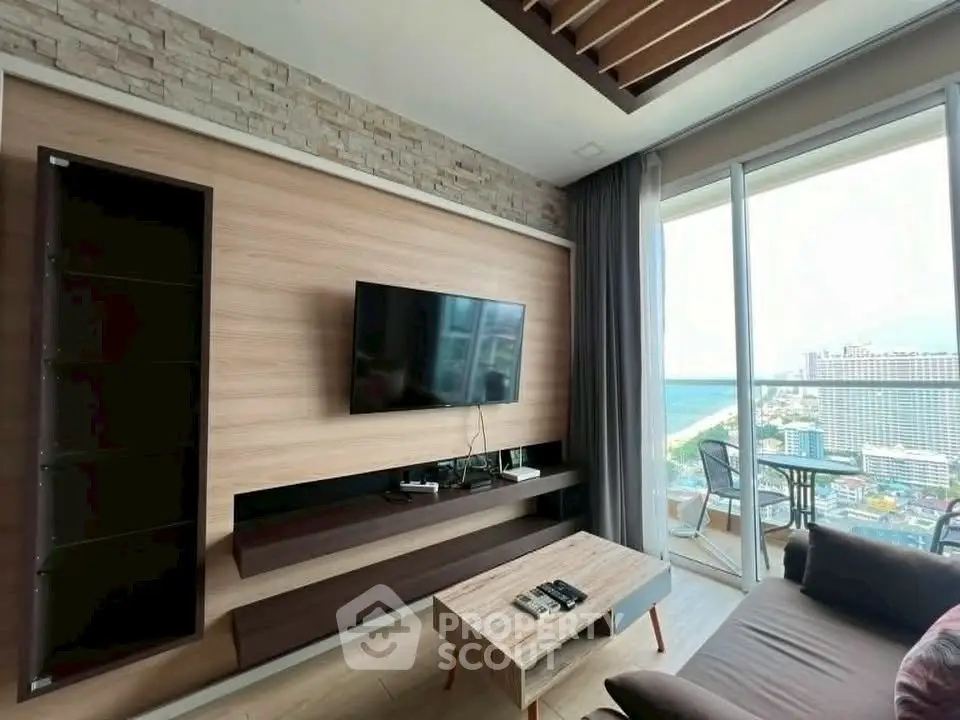 Modern living room with stunning city view and balcony access