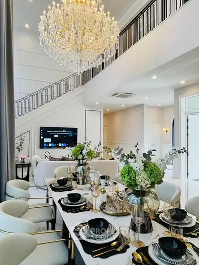 Luxurious dining room with elegant chandelier and modern decor