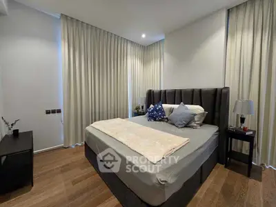 Luxurious bedroom with elegant decor and plush bedding in modern apartment
