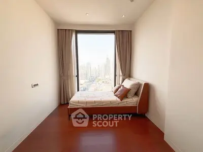 Modern bedroom with stunning city view and elegant decor