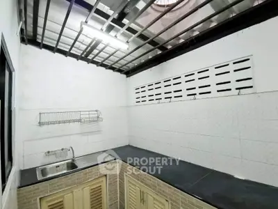 Compact kitchen with open layout and modern fixtures