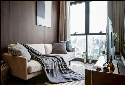 Stylish living room with city view, cozy sofa, and modern decor
