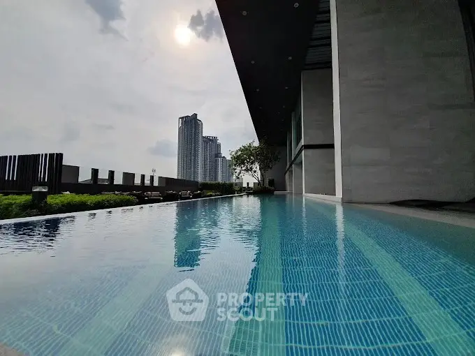 Luxurious rooftop pool with stunning city skyline view