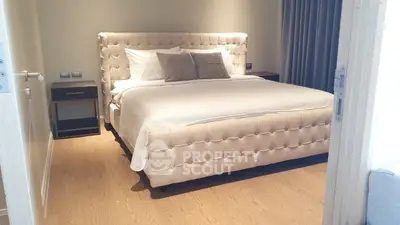 Luxurious bedroom with plush bed and elegant decor