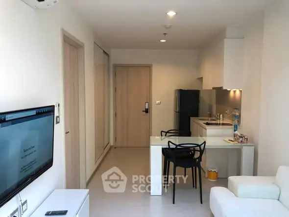 Modern apartment interior with open kitchen and stylish furniture