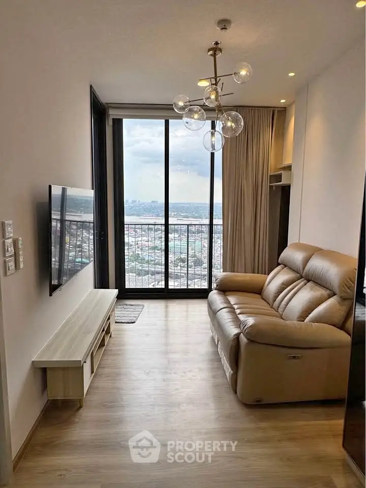 Modern living room with stunning city view and stylish lighting