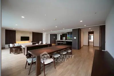 Spacious modern living room with elegant dining area and open layout