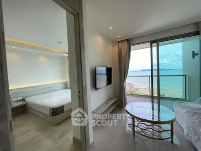 Luxurious beachfront apartment with stunning ocean view and modern interior design.
