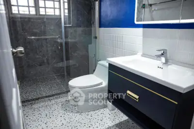 Modern bathroom with sleek fixtures and stylish tile design