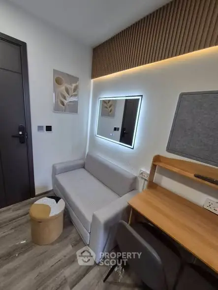 Modern compact living room with stylish decor and functional furniture