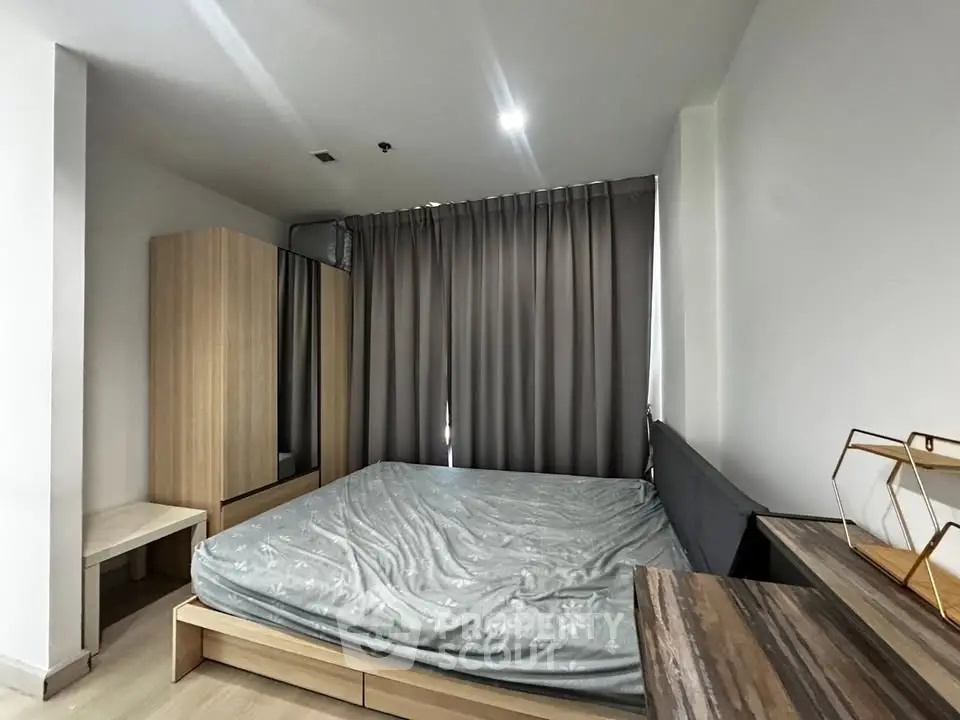 Modern bedroom with sleek furniture and neutral tones