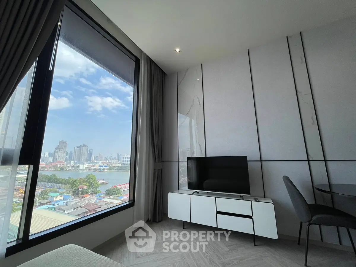 Modern living room with stunning city view and sleek furniture