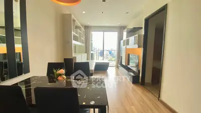 Modern living room with elegant dining area and city view