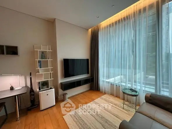 Modern living room with large window and stylish decor