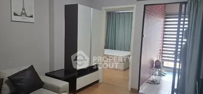 Modern apartment interior with cozy living room and bedroom view