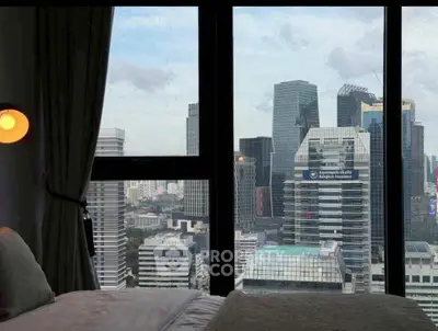 Luxurious bedroom with stunning city skyline view from large windows, perfect for urban living.