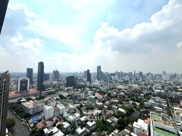 Stunning cityscape view from high-rise building showcasing urban skyline and vibrant city life.
