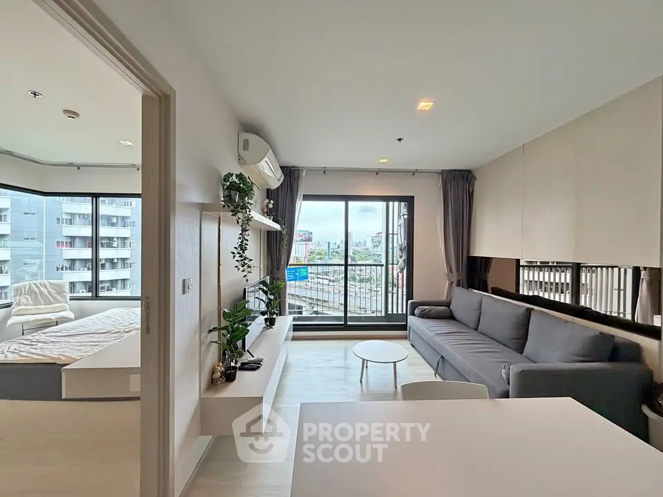 Modern living room with balcony view in stylish apartment