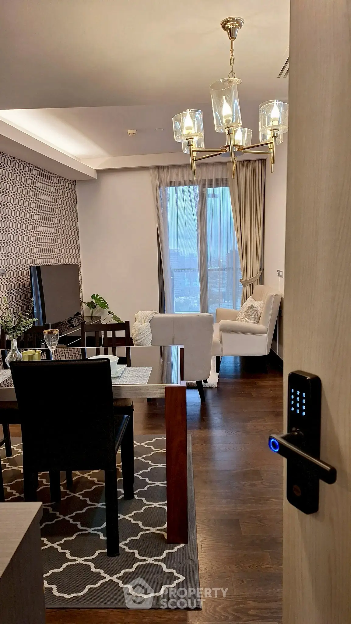 Stylish living room with elegant lighting and modern decor in a luxurious apartment.
