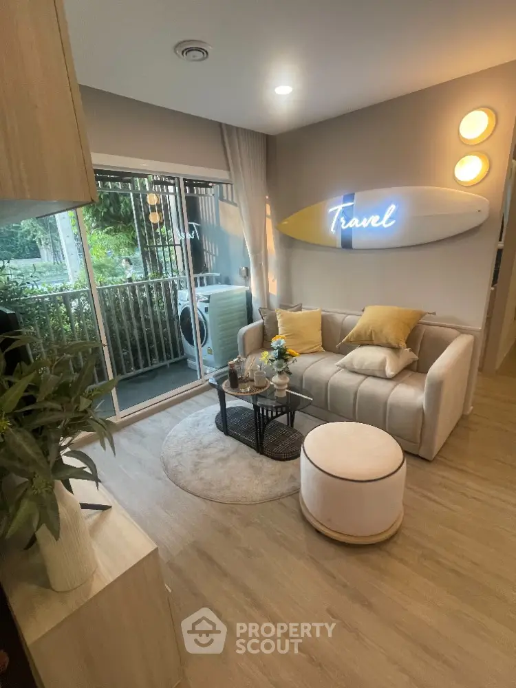 Cozy living room with modern decor and garden view, perfect for relaxation and entertaining.