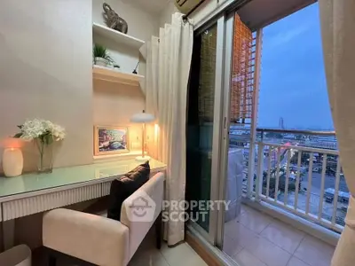 Chic study nook with balcony view in modern apartment