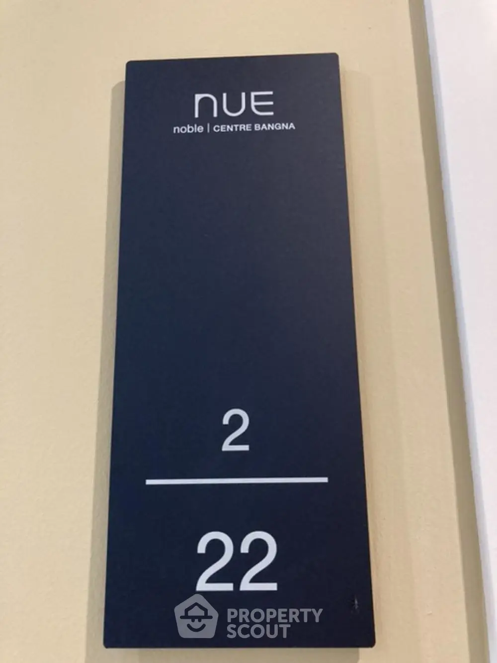 Noble Centre Bangna floor sign indicating level 2 and unit 22.