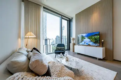 Luxurious modern living room with stunning city view and stylish decor