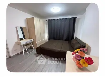 Cozy bedroom with modern furniture and elegant decor, perfect for relaxation and comfort.