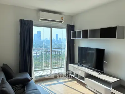 Modern living room with city view, featuring sleek furniture and large window for natural light.