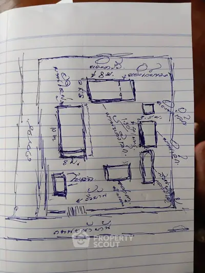 Hand-drawn real estate floor plan sketch on lined paper