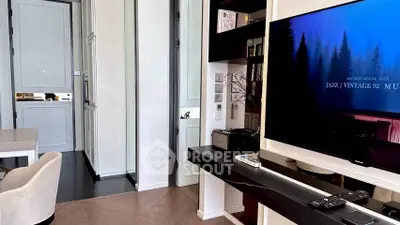 Modern living room with sleek TV setup and elegant decor