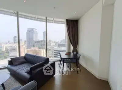 Modern living room with panoramic city view and stylish furniture